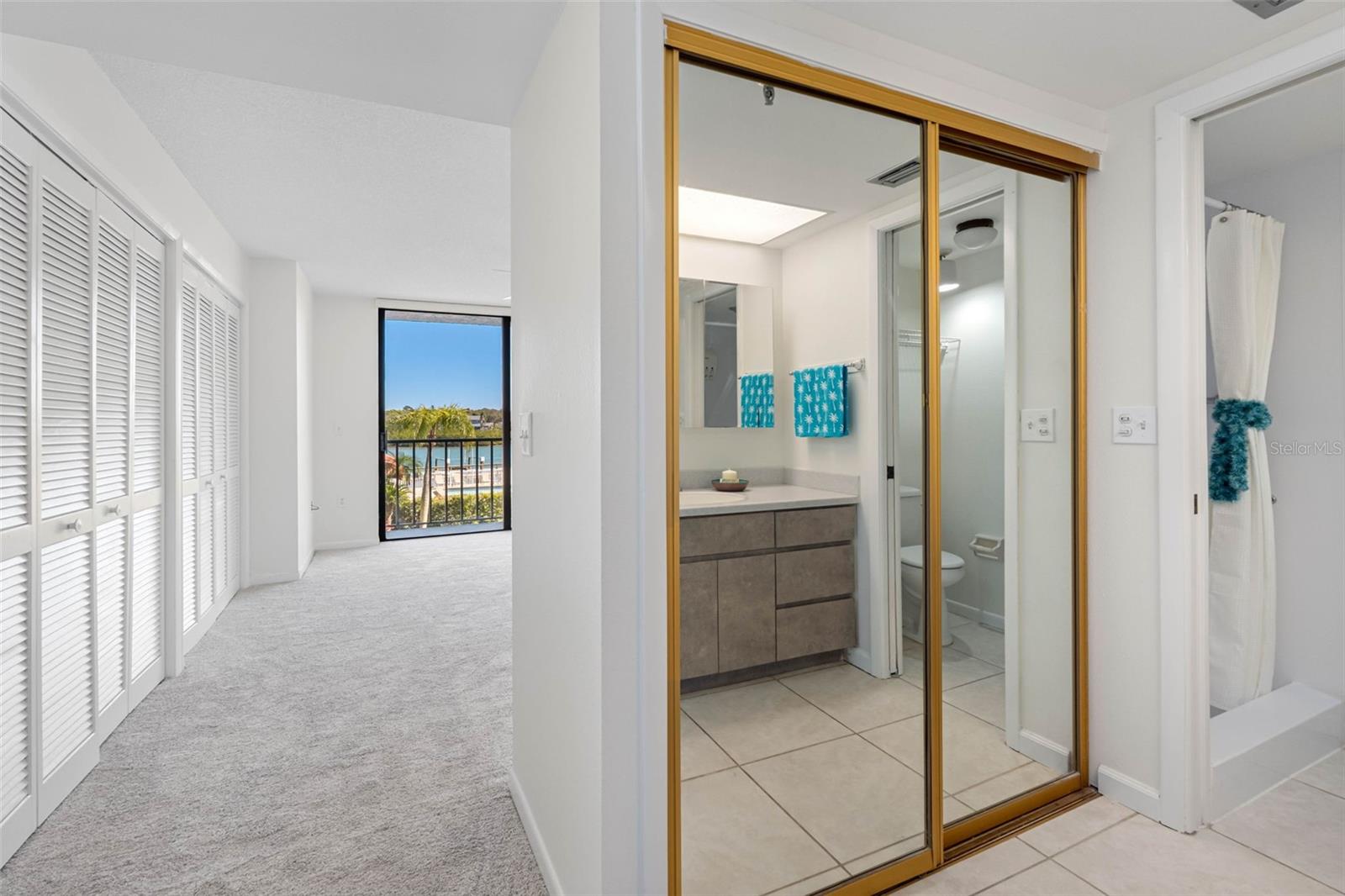 .. En-Suite Master Bedroom 13.4X 23.11...3 Banks of Closets PLus another 5 ' Closet in Bathroom Entrance w Morrored Doors.