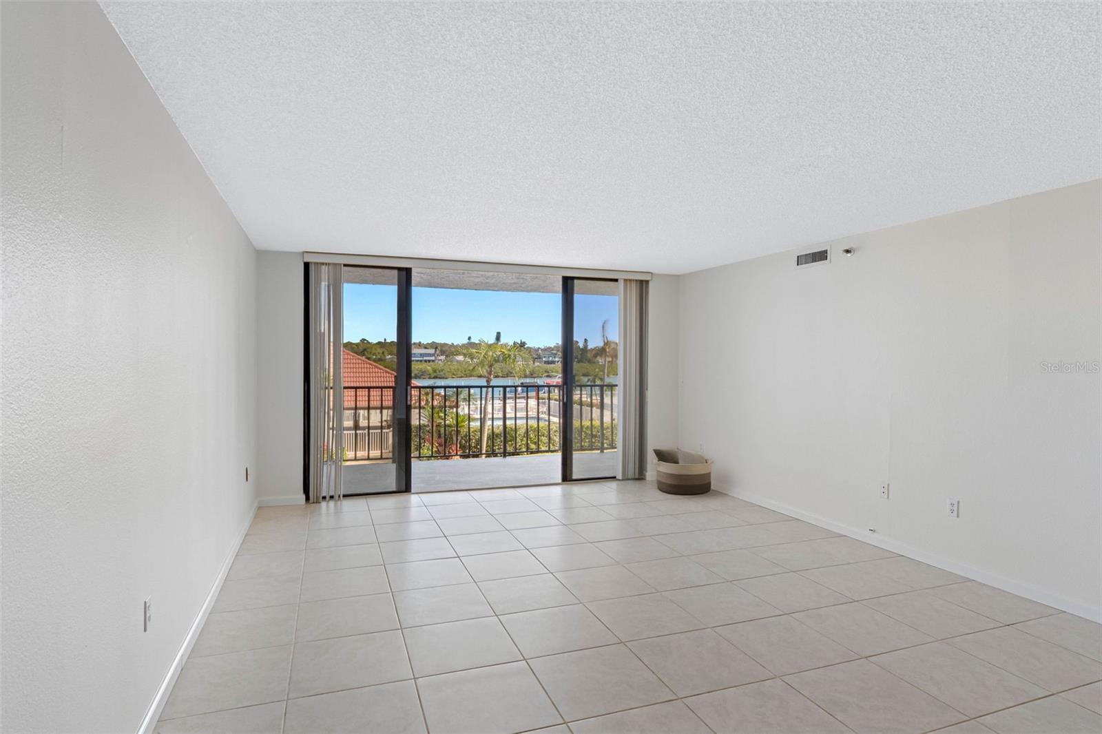 ... The Living room run from Kitchen to Balcony Doors is a good 26 Feet. Living room area alone is 15.3 X 15.9.. Dining Room Area 15.3 X 9.7.. The 30 foot Waterfront Balcony fronts both Living Room & Master Bedroom Suite.