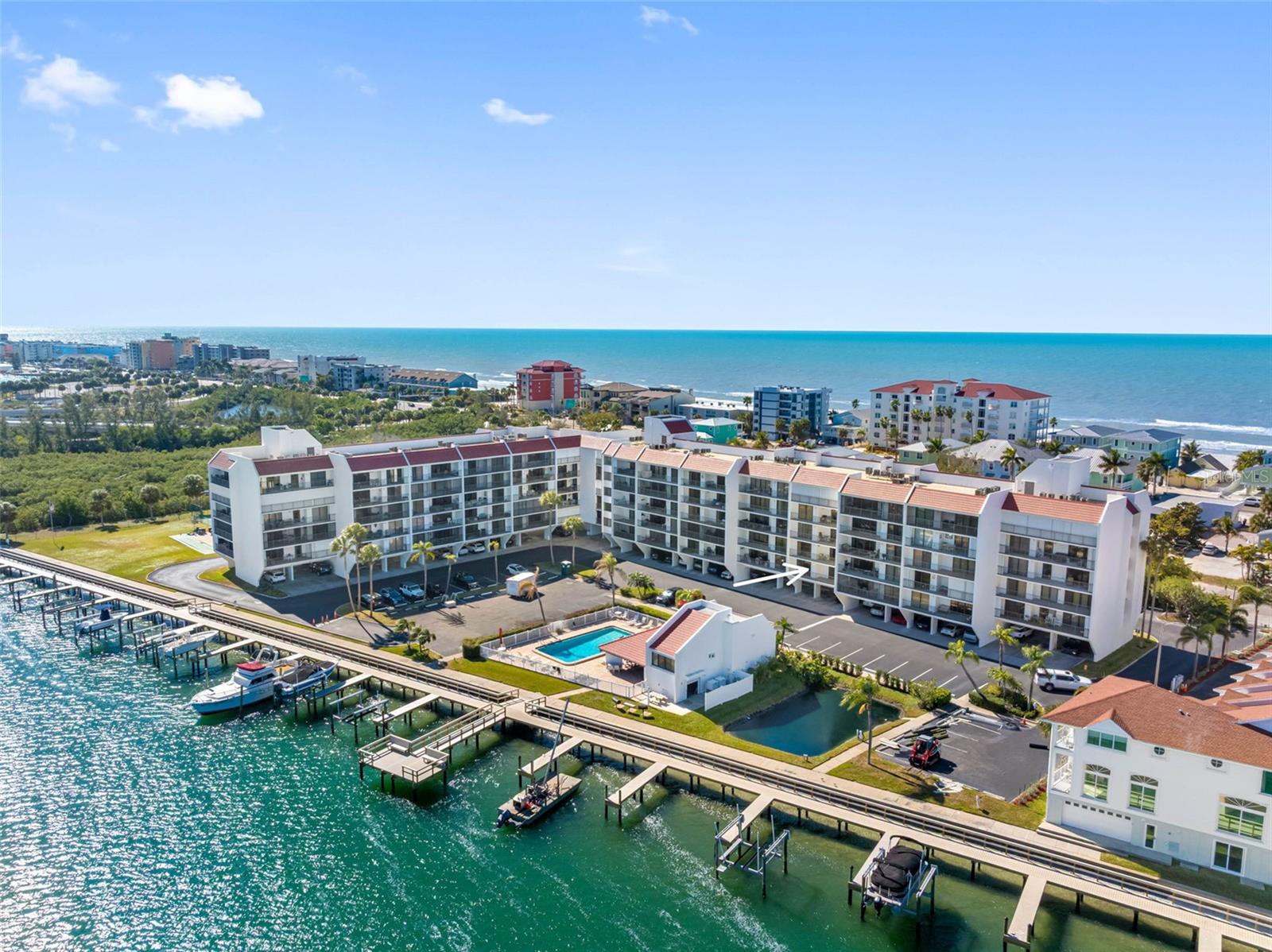 .. Morning Sun coming from the South East.. In the Summer it will be directly overhead.. That Condo on the Beach with the Red Roof. - $3Million.. Therefore Vista Bay must appreciate in a few years.. You cannot have that kind of separation in price point right. across the street. Once the Promenade is fully  completed - Boats will be back in full force..