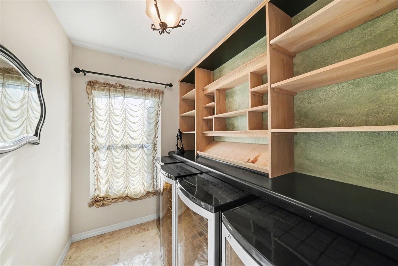 Melt away the day in your secret little wine bar space! 4 chillers are waiting for your best selections!