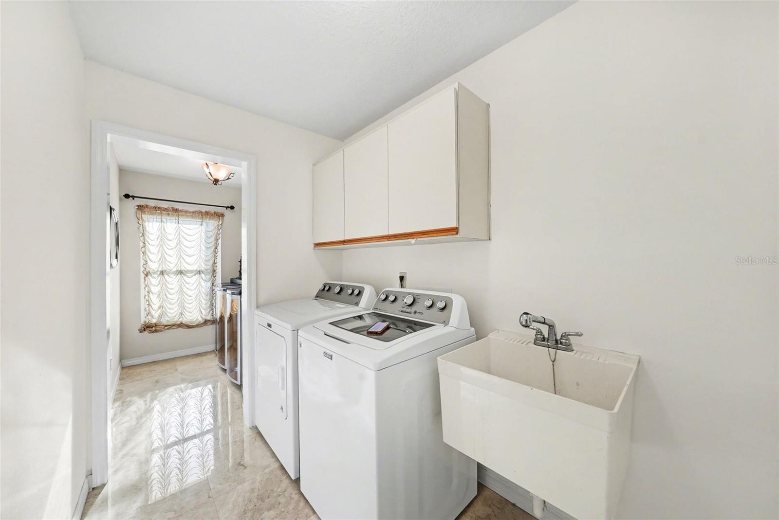Utility space convenient off kitchen!