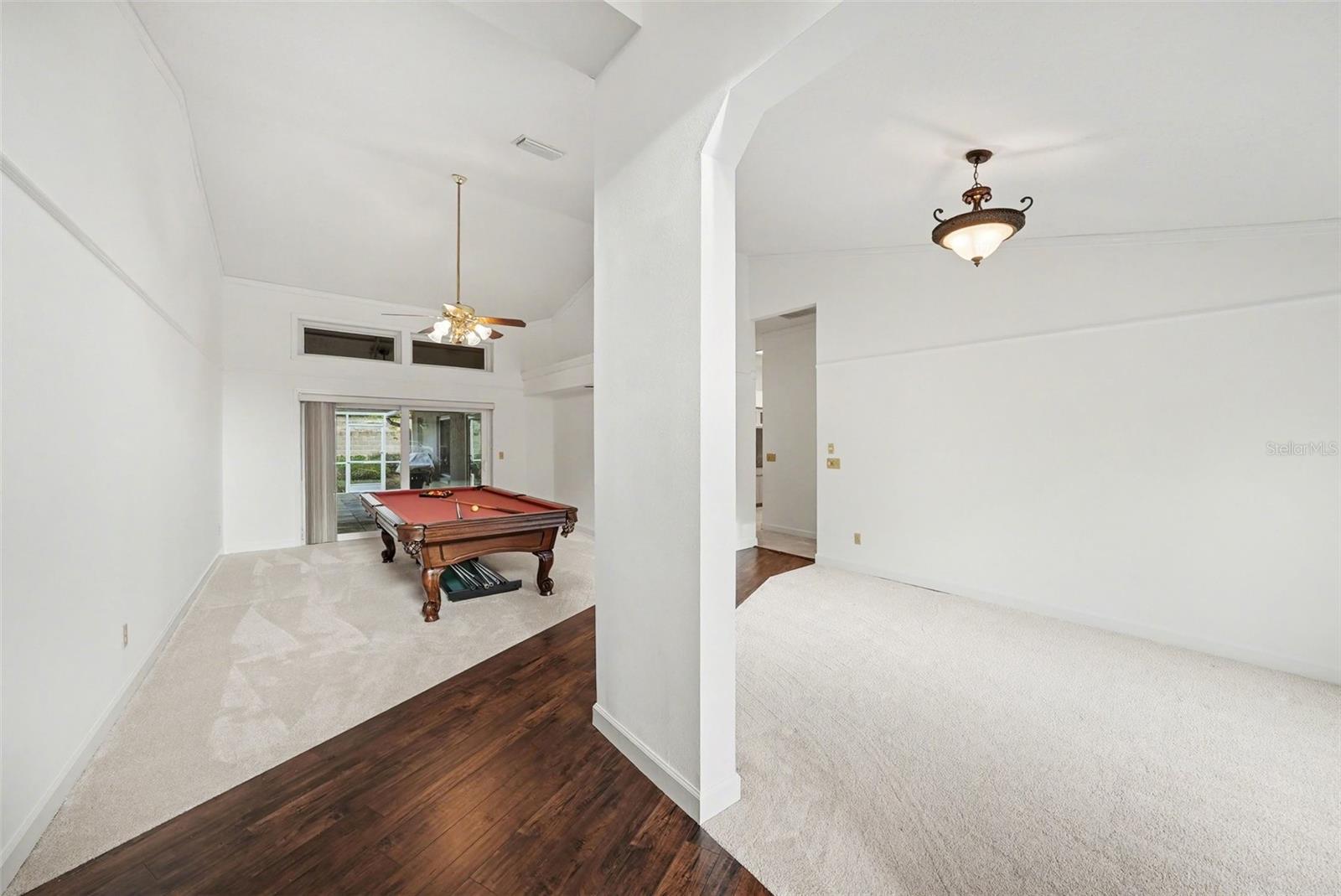 Foyer entry welcomes you to your formal dining & living/game room spaces!