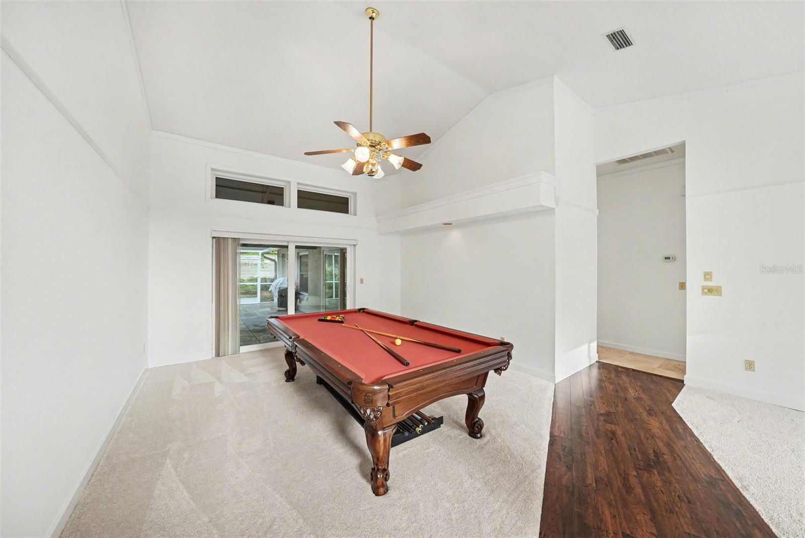 Soaring ceilings make this a fabulous spot for entertaining!