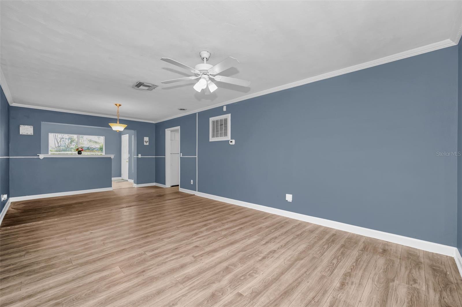 Laminate floors throughout living area.