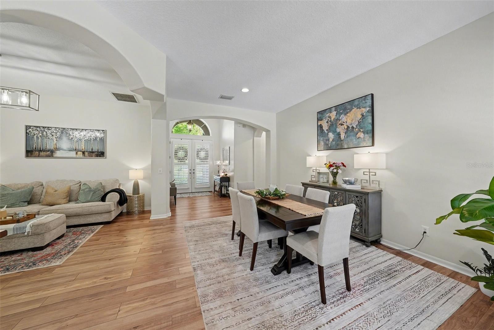 Once inside your double doors you'll be welcomed with light neutral walls, waterproof luxury vinyl plank flooring throughout, and an exceptional living space - both inside and out.