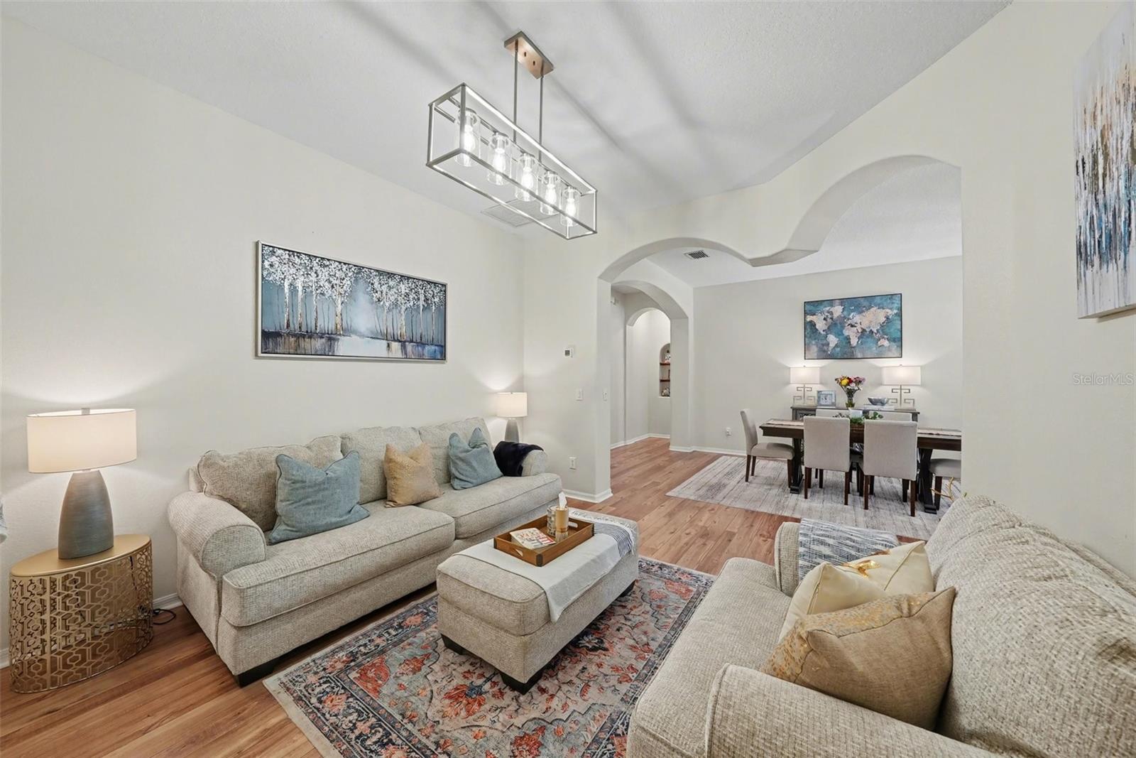 The formal living room is tucked away at the front of the home and offers a cozy space to unwind.