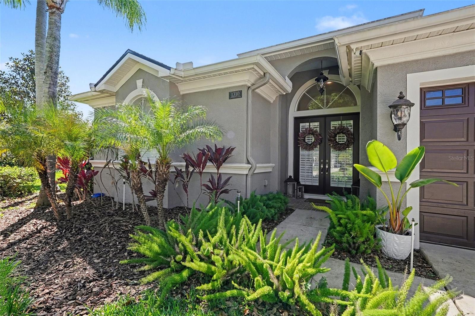 Sophisticated, warm and inviting, 1310 Oxbridge Drive has it all.