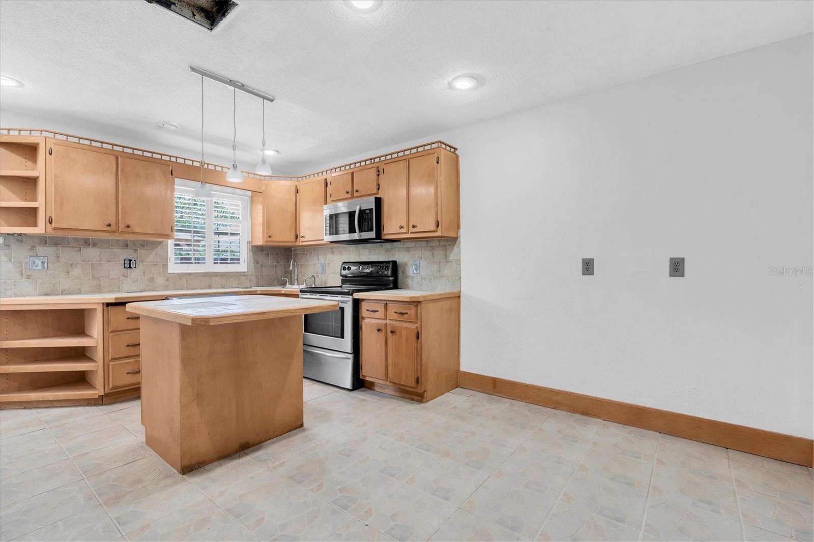Spacious kitchen with eat-in area