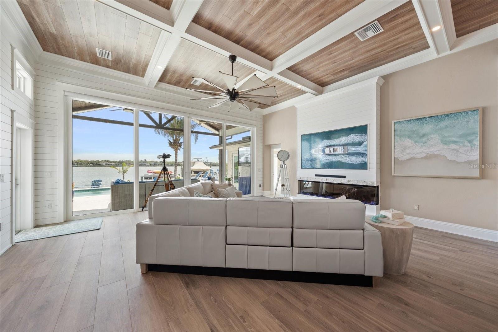 LIVING ROOM WITH SOARING CEILING