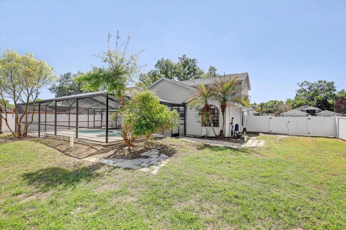Fenced yard with pool enclosure