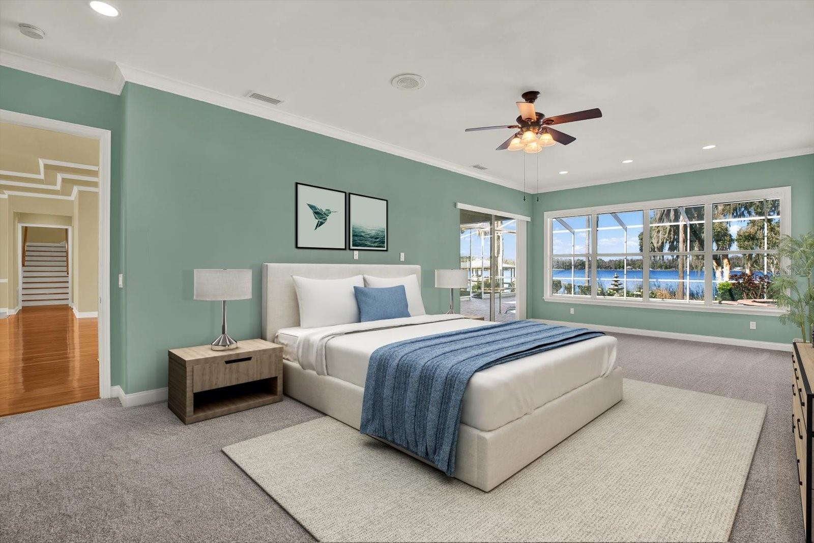 Wake up to lake views from the primary suite.