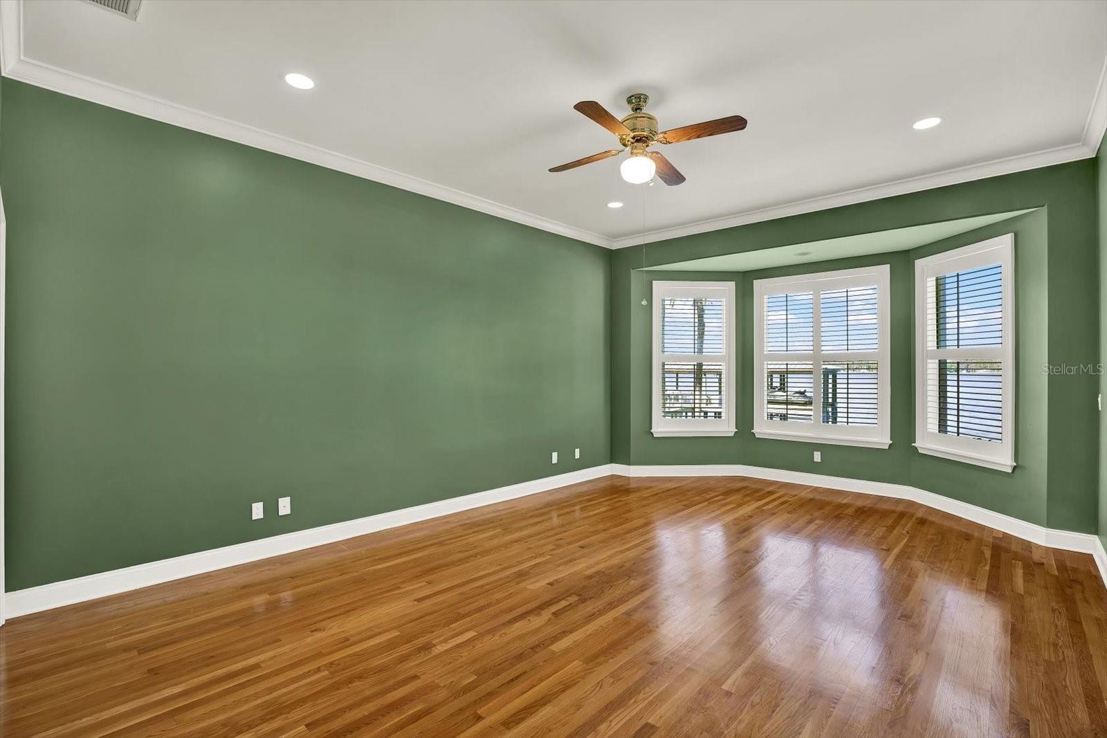 The large back bedroom enjoys panaramic views of the lake.