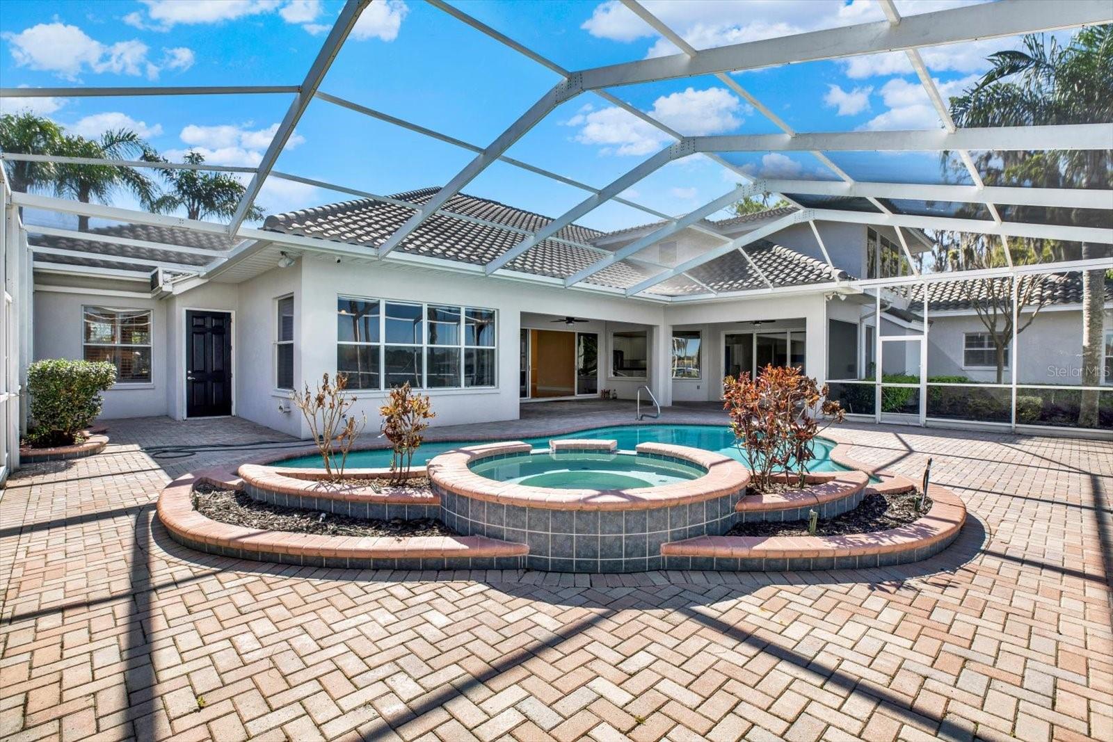 The spacious patio includes a large shaded area to cool off, along with ample space to bask in the Florida sunshine.