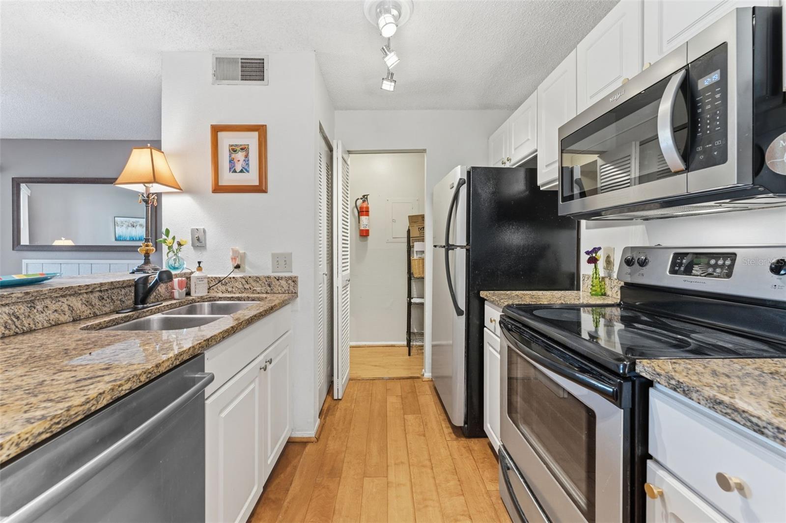your kitchen has a nice walk in pantry for extra storage!