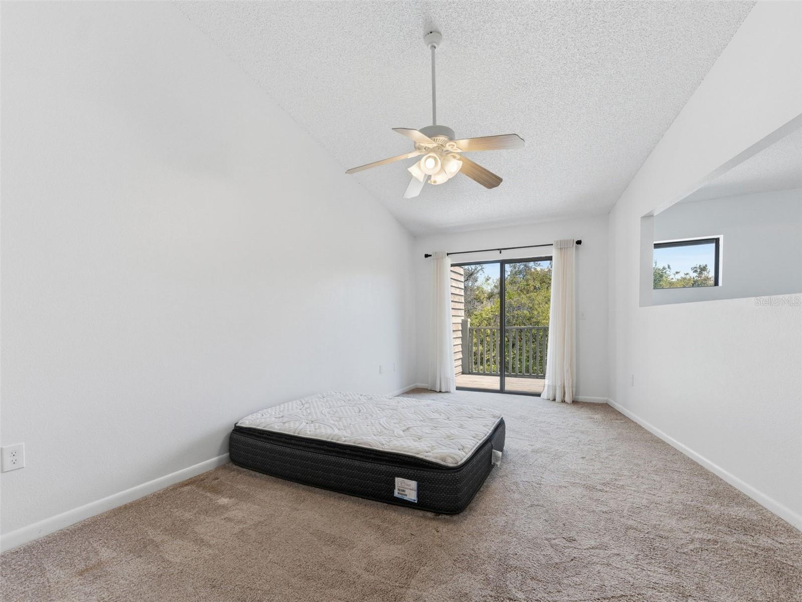 Master Bedroom Leading to a Balcony