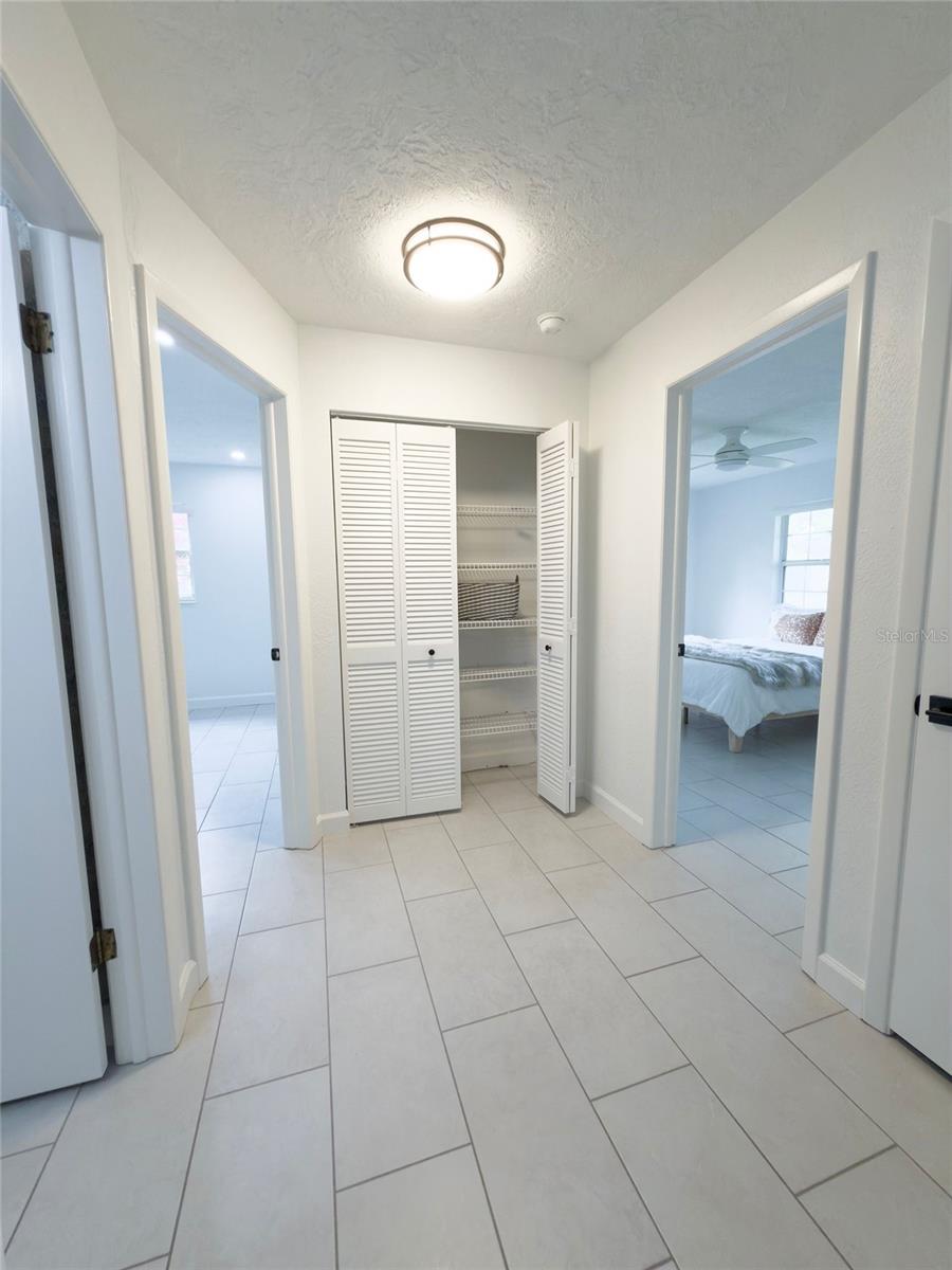Hallway-guest room on left, owner's suite on right