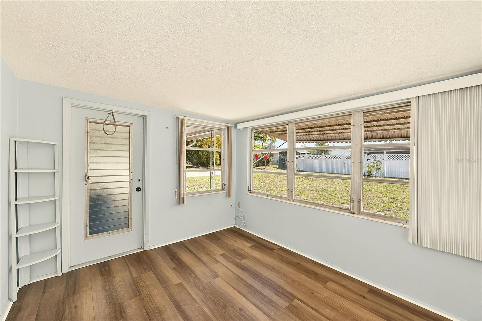 View of family room with door out to back porch