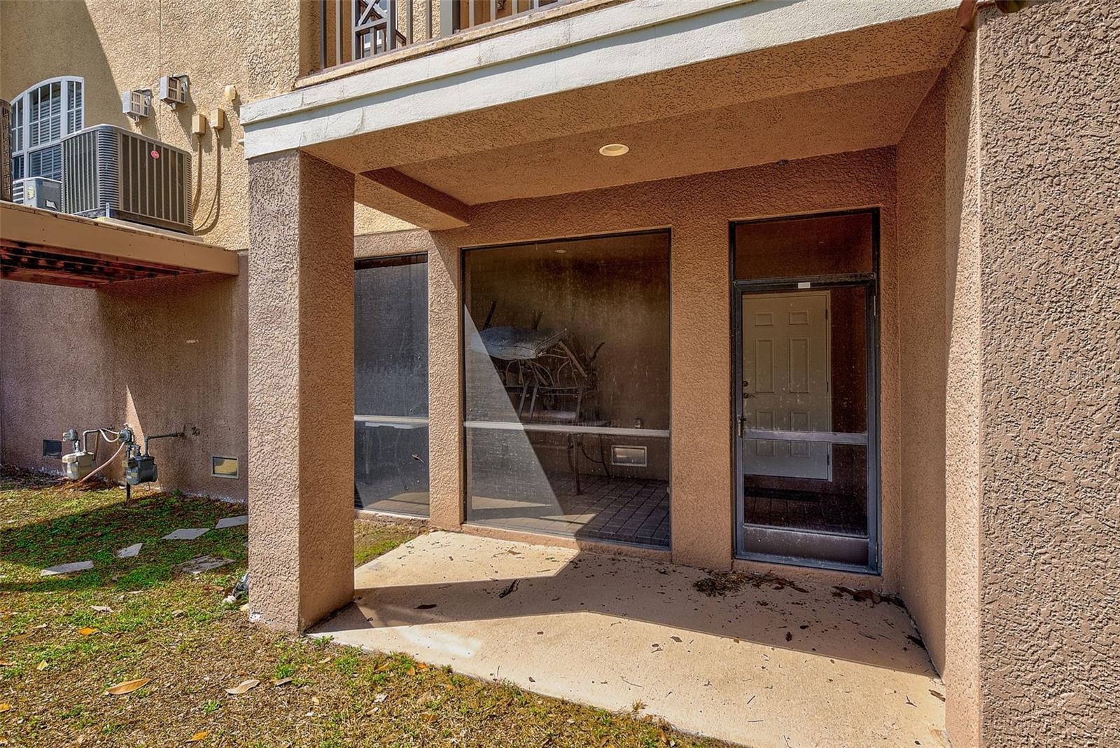 1ST LEVEL COVERED PATIO & SCREEN LANAI