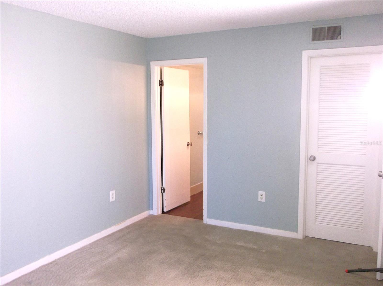 Bath room off bedroom other door is to walk-in closet