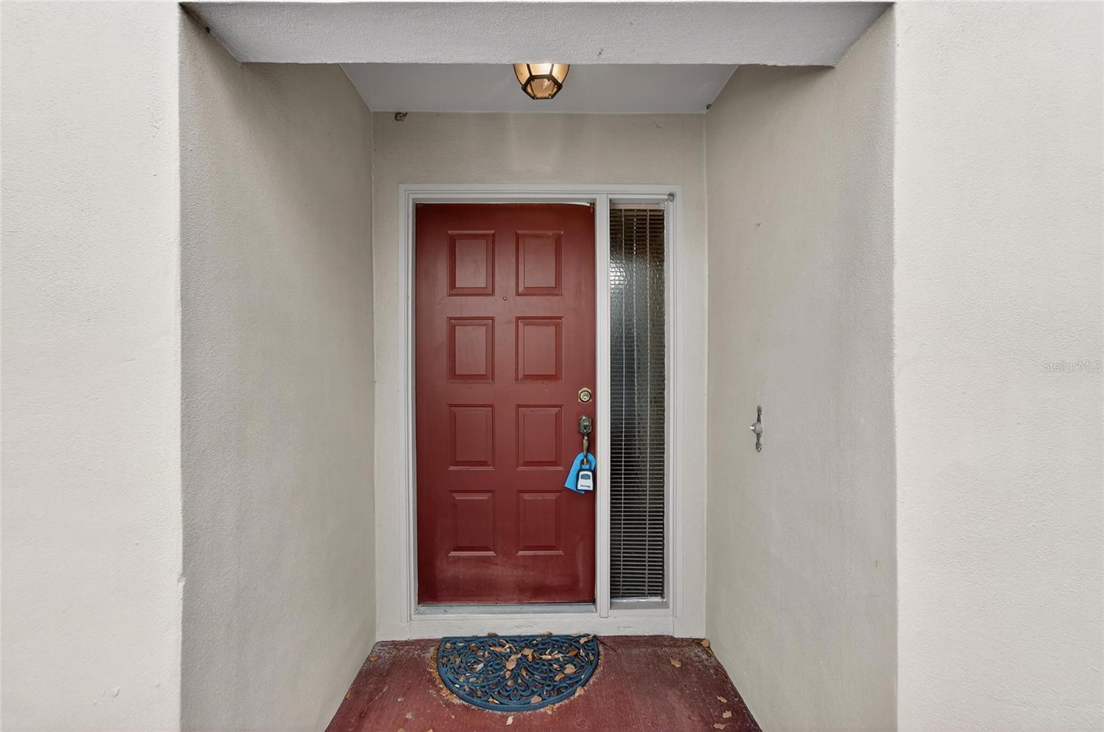 Front door on west side of home