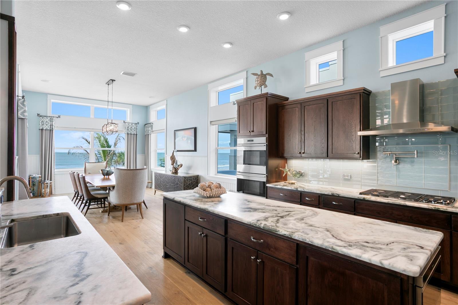 The upper windows allow beautiful natural light to flow into the kitchen, making meal prep enjoyable