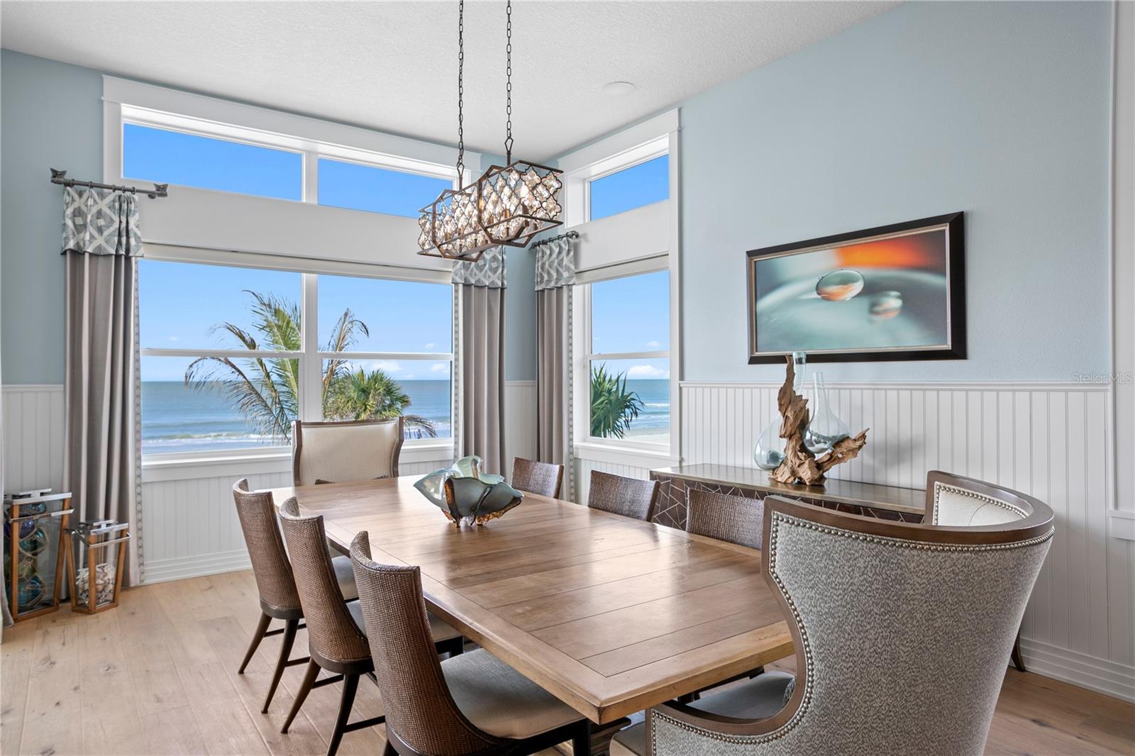 The spacious dining room is comfortable for cozy dinners or large family gatherings