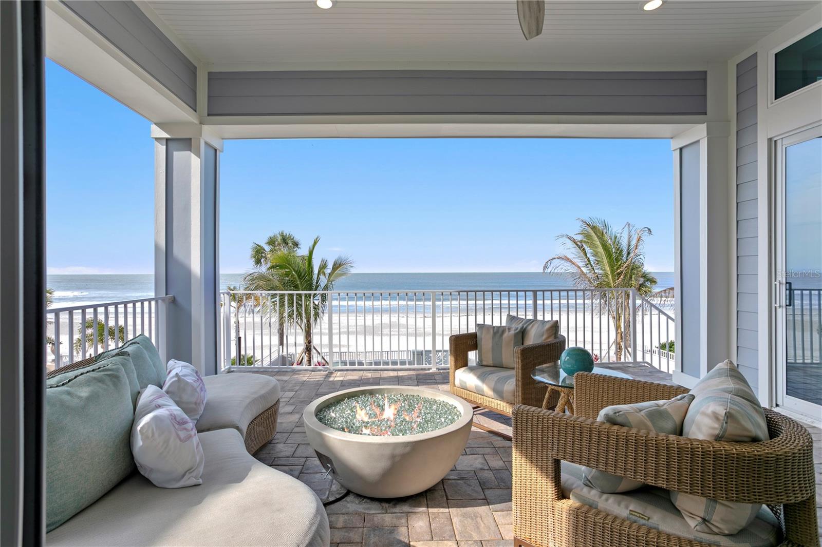 Spacious covered balcony off of great room and dining