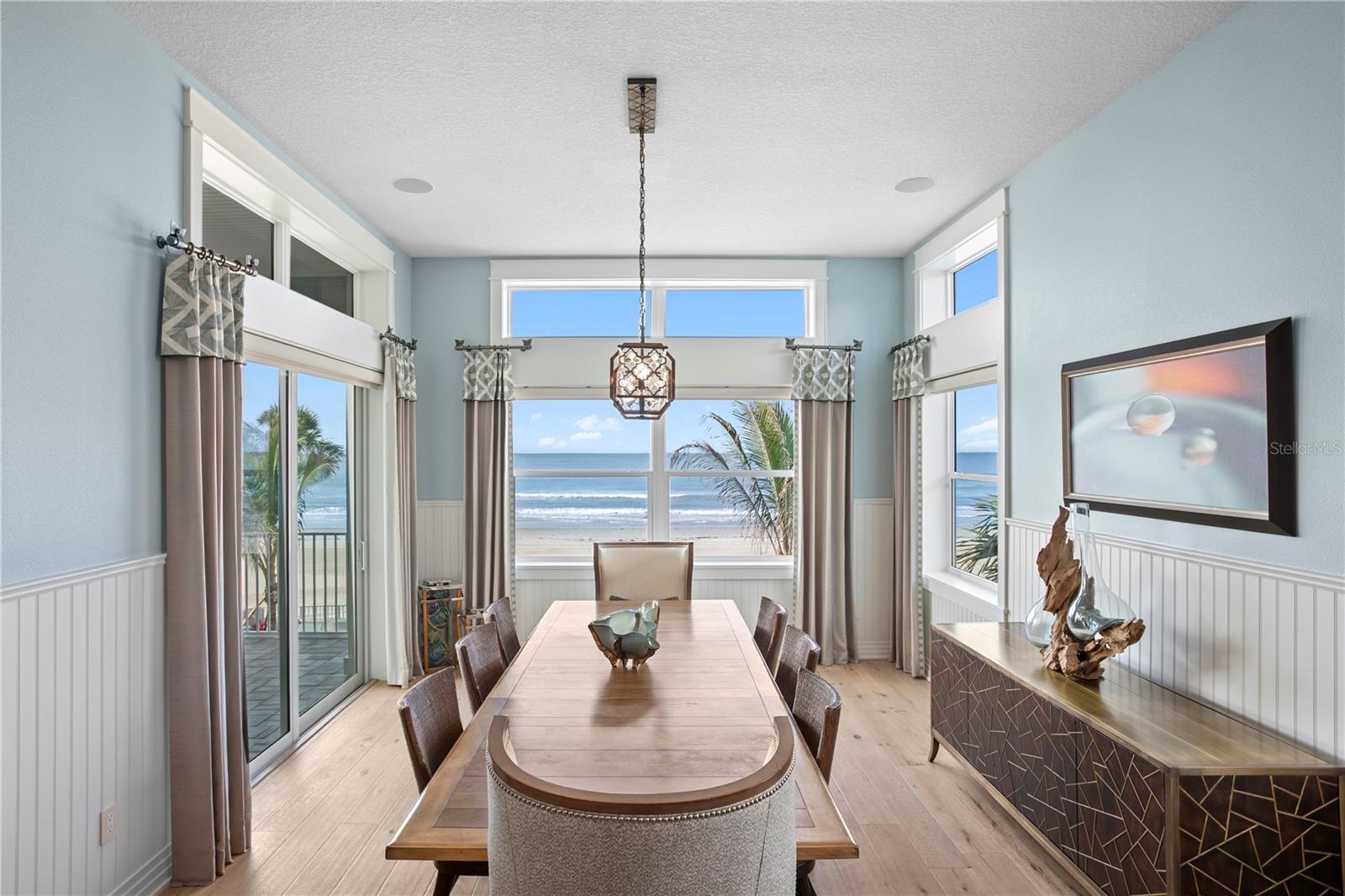 Shiplap details add warmth and texture to this beautiful dining room.
