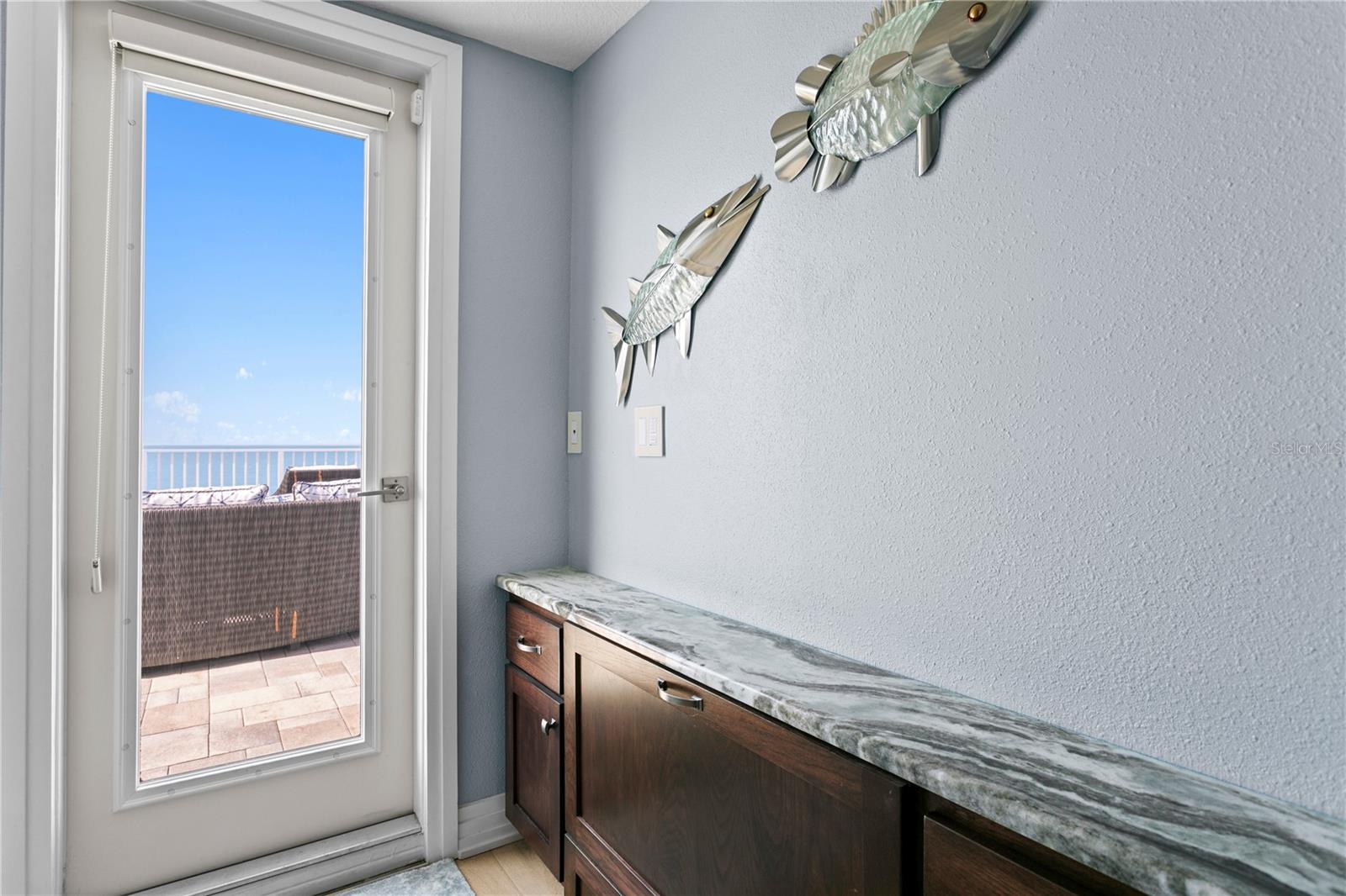 Entrance to Rooftop Terrace with Built in Refrigerator Drawer, keeping your favorite beverages conveniently chilled and at your finger tips!