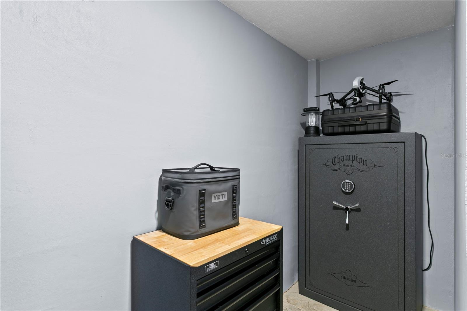 Storage space on ground level with built in safe