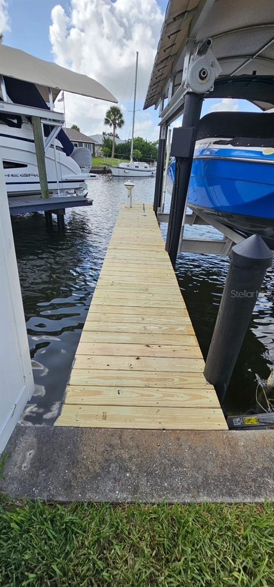 New pressure treated wood on dock