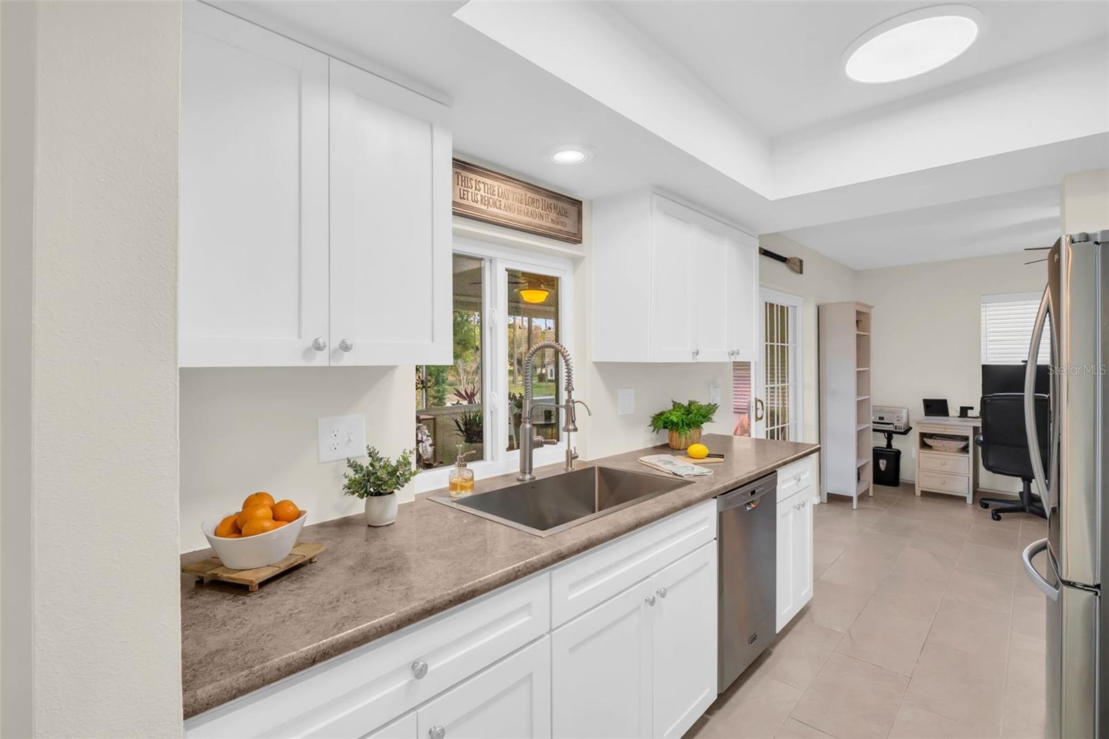 An open galley kitchen that doesn't feel closed in~