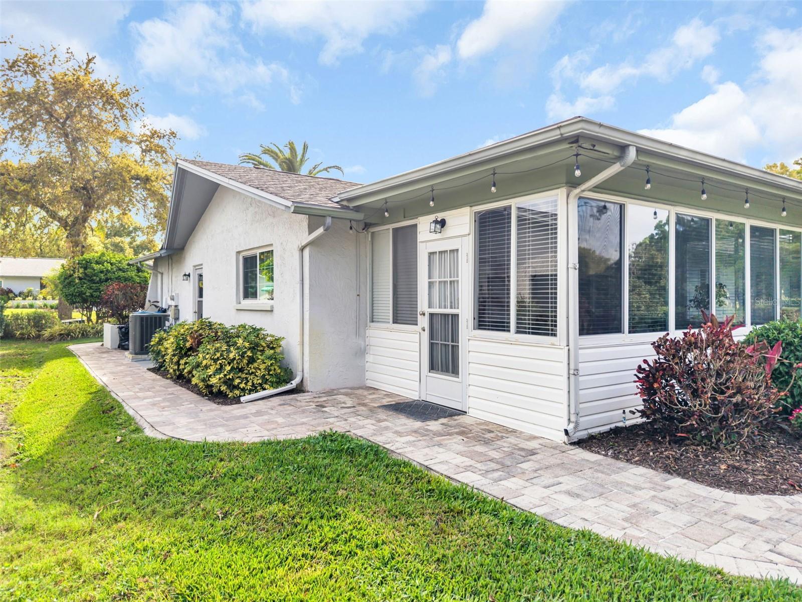 Hardscaping continues along the side for a neat tidy yard~