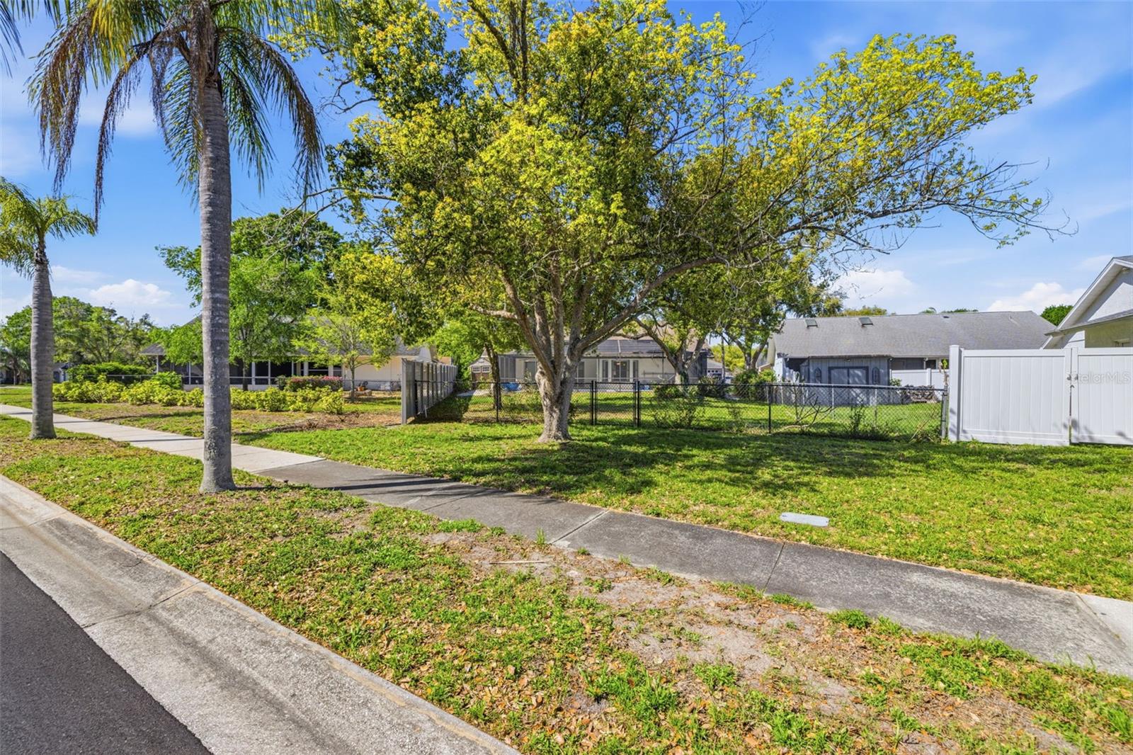 Backyard extends to street behind -you could add a gate and park your boat in your own backyard!
