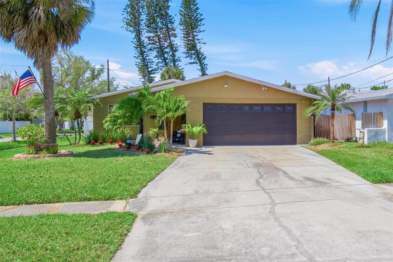 Two Car Garage with an oversized driveway