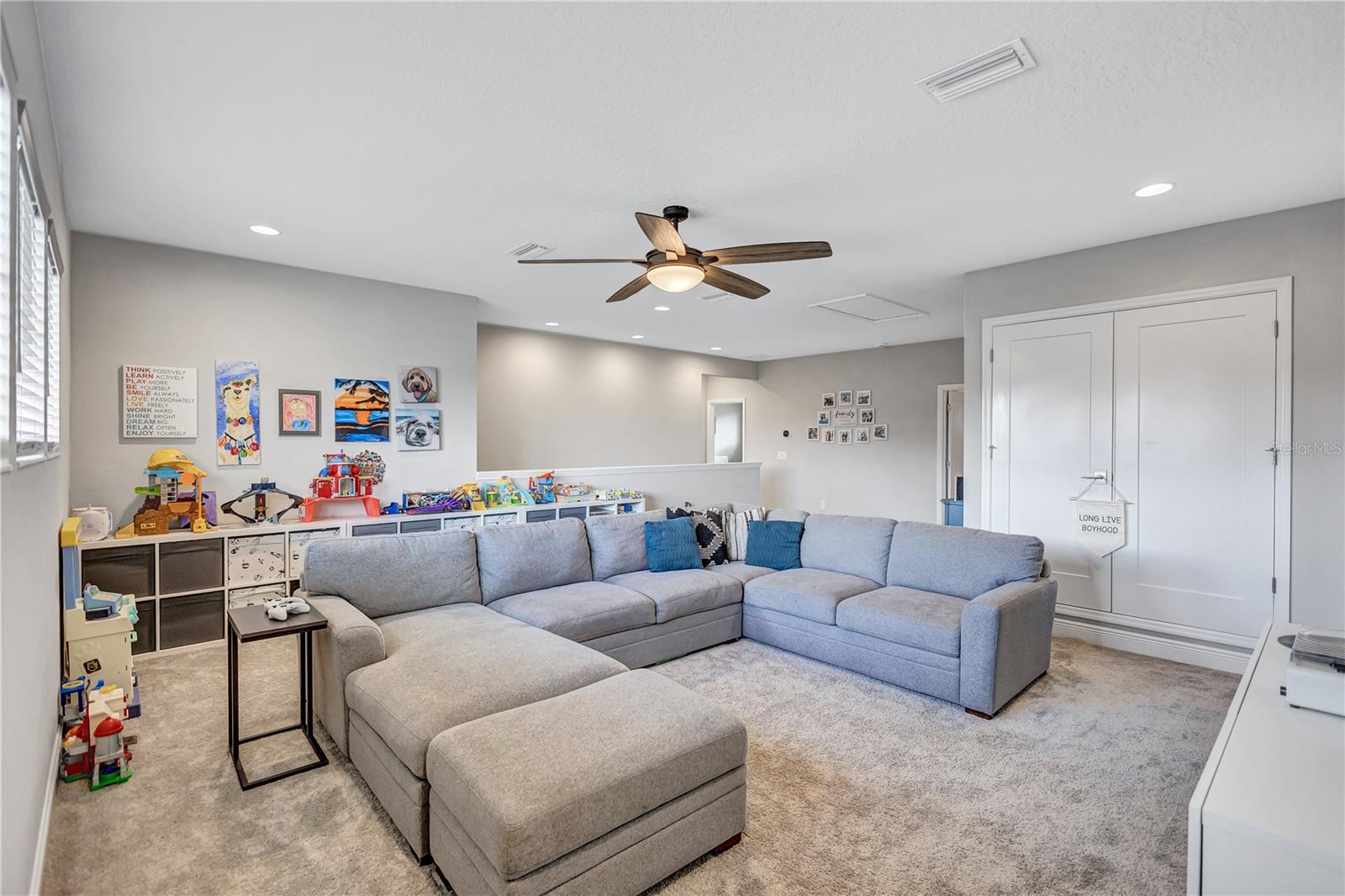 The perfect flex space for movies, game nights, home gym, or a playroom….You decide!