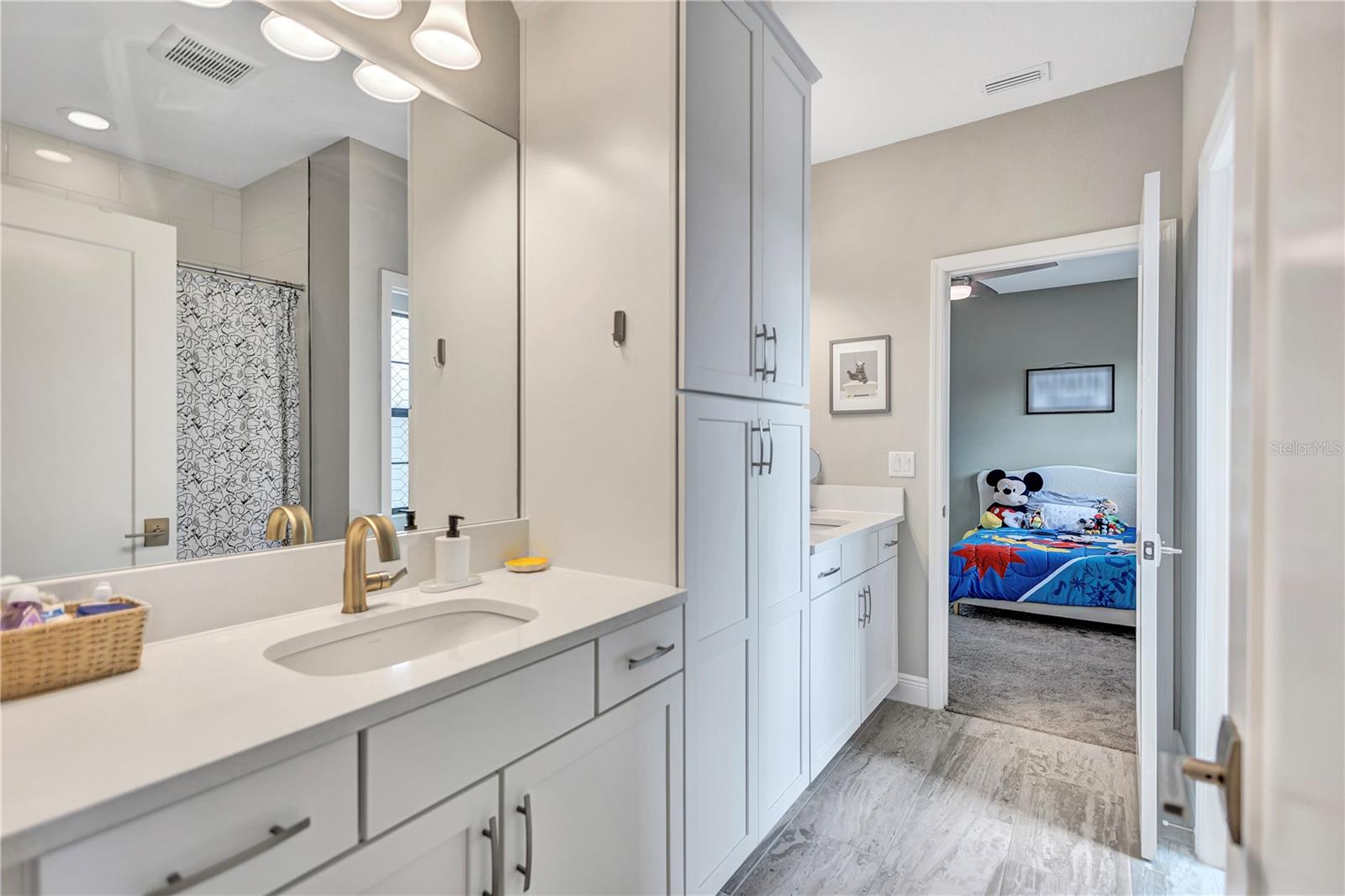 Jack-and-Jill Bathroom; perfect for siblings or guests seeking both connection & privacy.