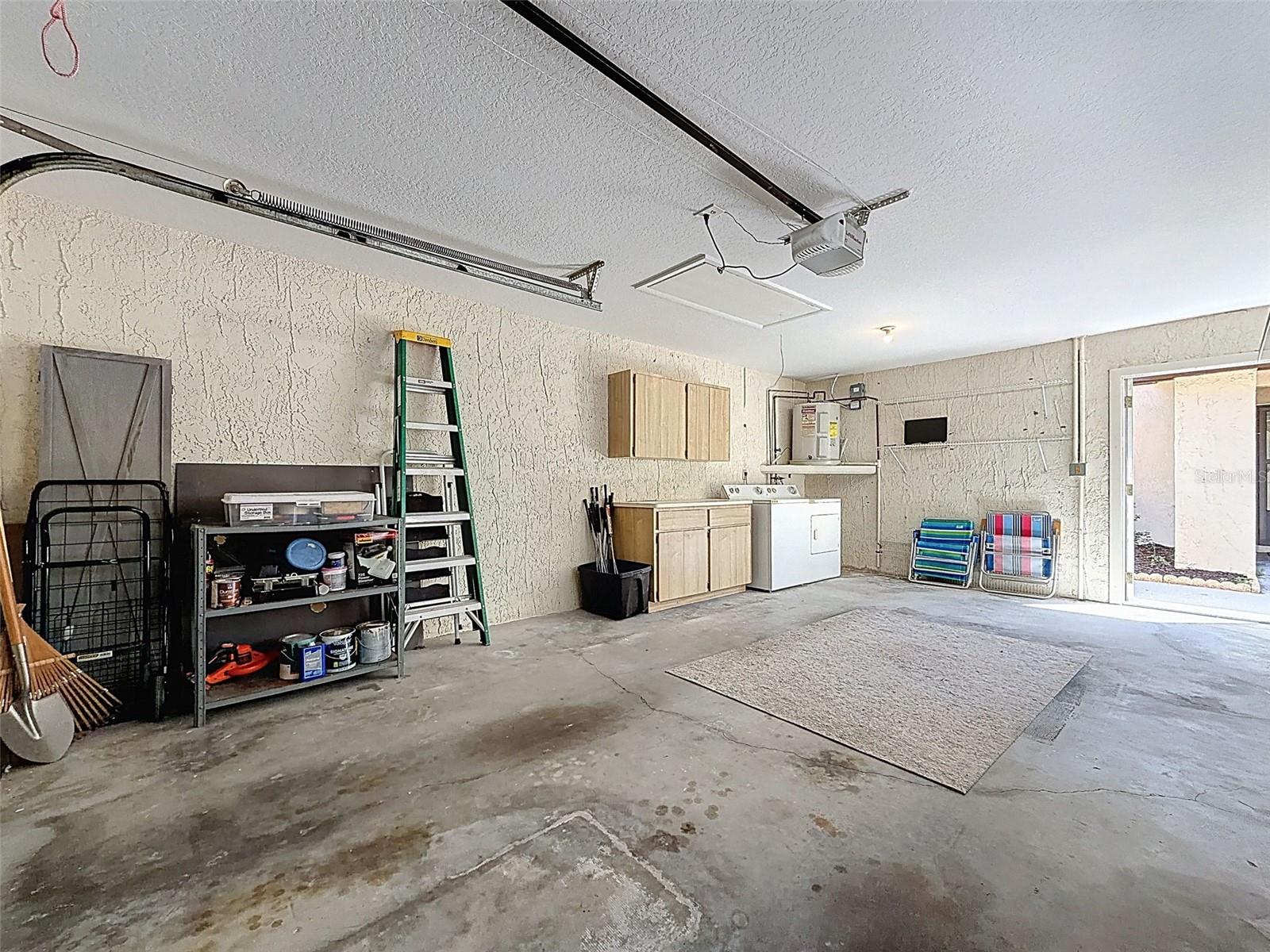 detached garage,   washer and dryer, shelving