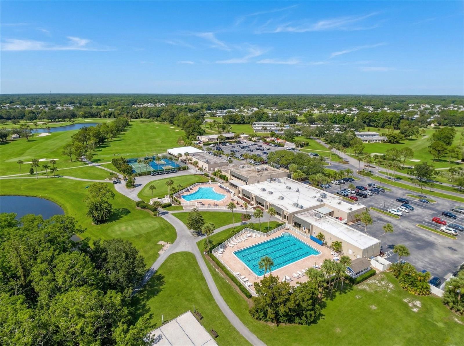 Two pools, tennis courts,  pickle ball,   fitness center and more
