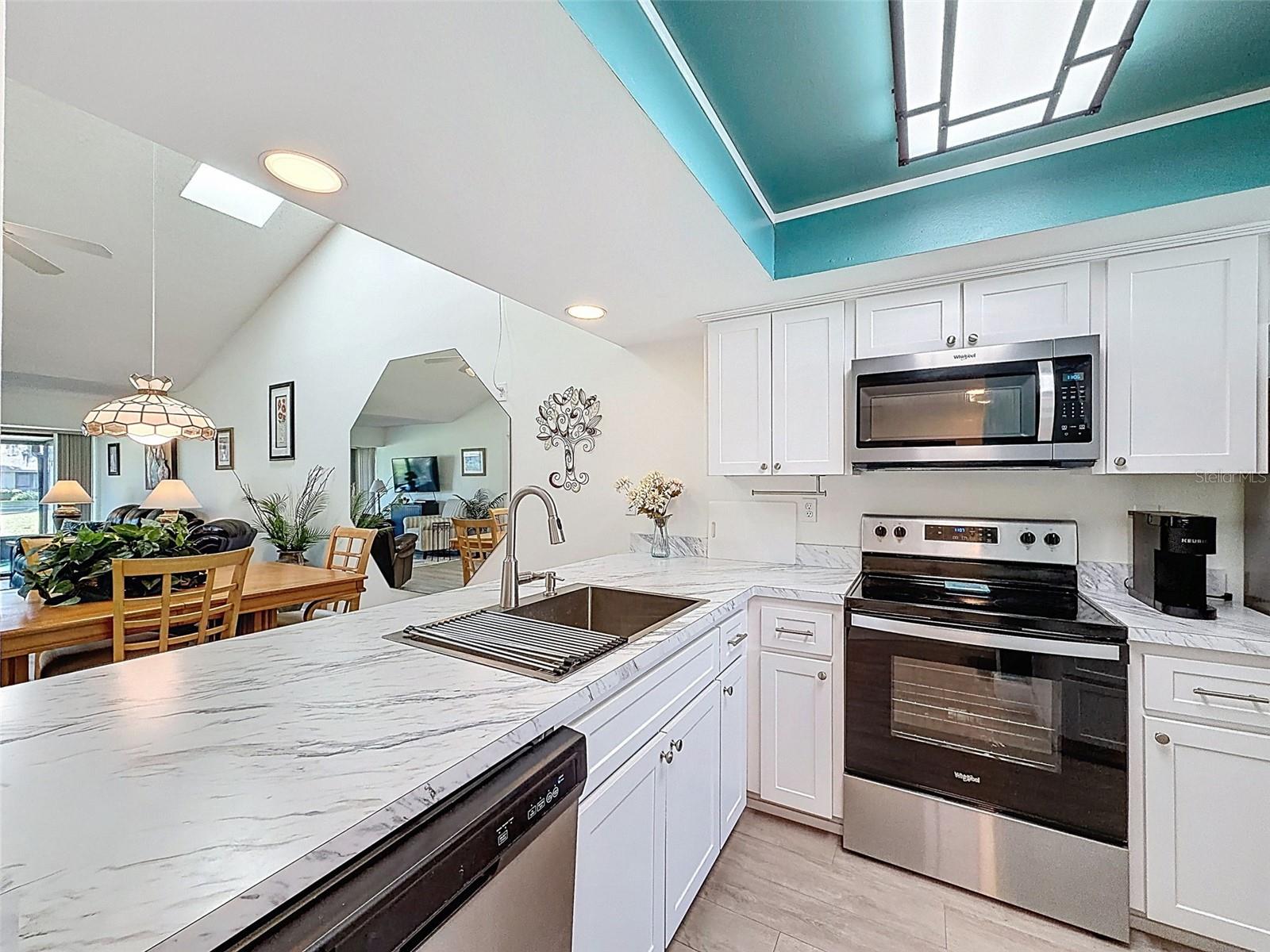 stainless steel appliances, upgraded kitchen,  fully furnished including all cookware and serving utensils