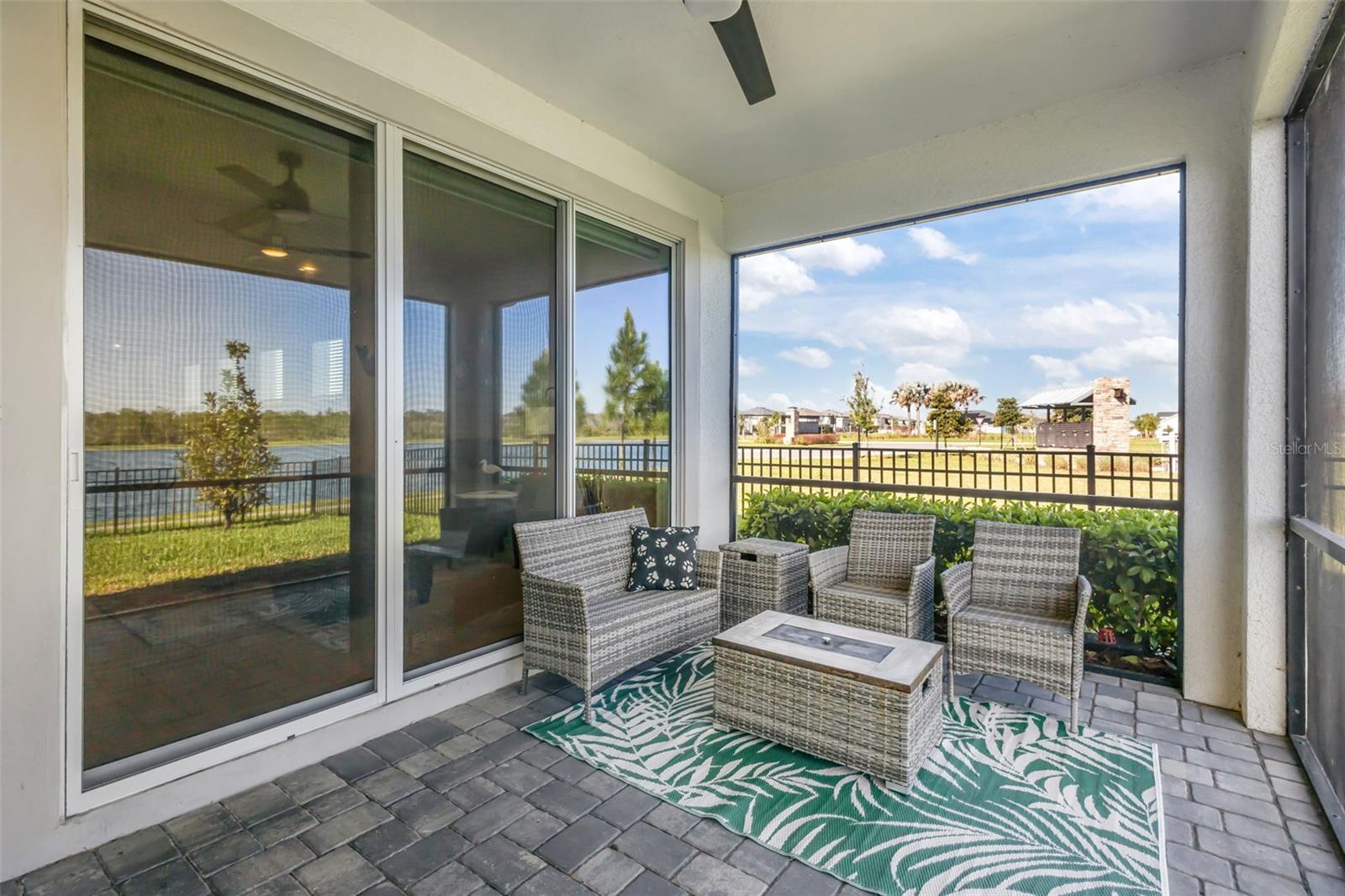 Screened-in lanai designed for relaxing and enjoying the outdoor setting.