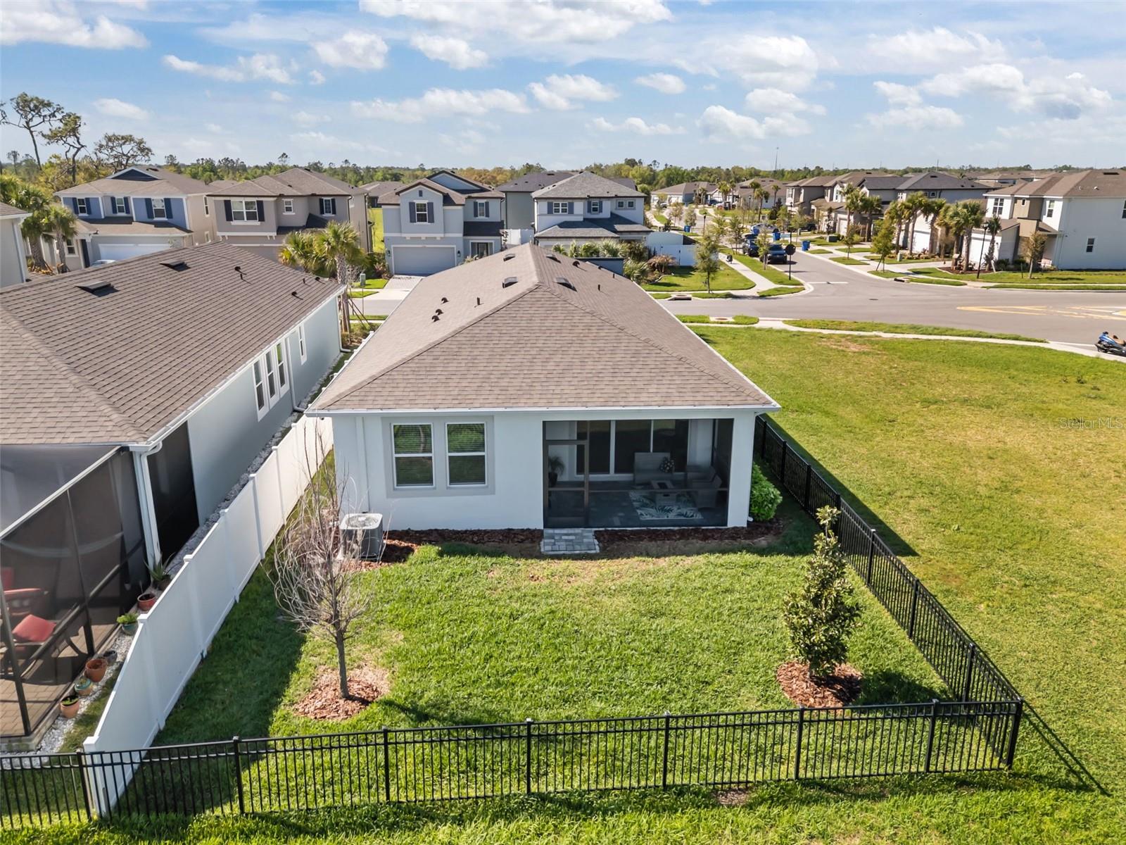 Fully fenced backyard offering privacy and room to enjoy the outdoors.
