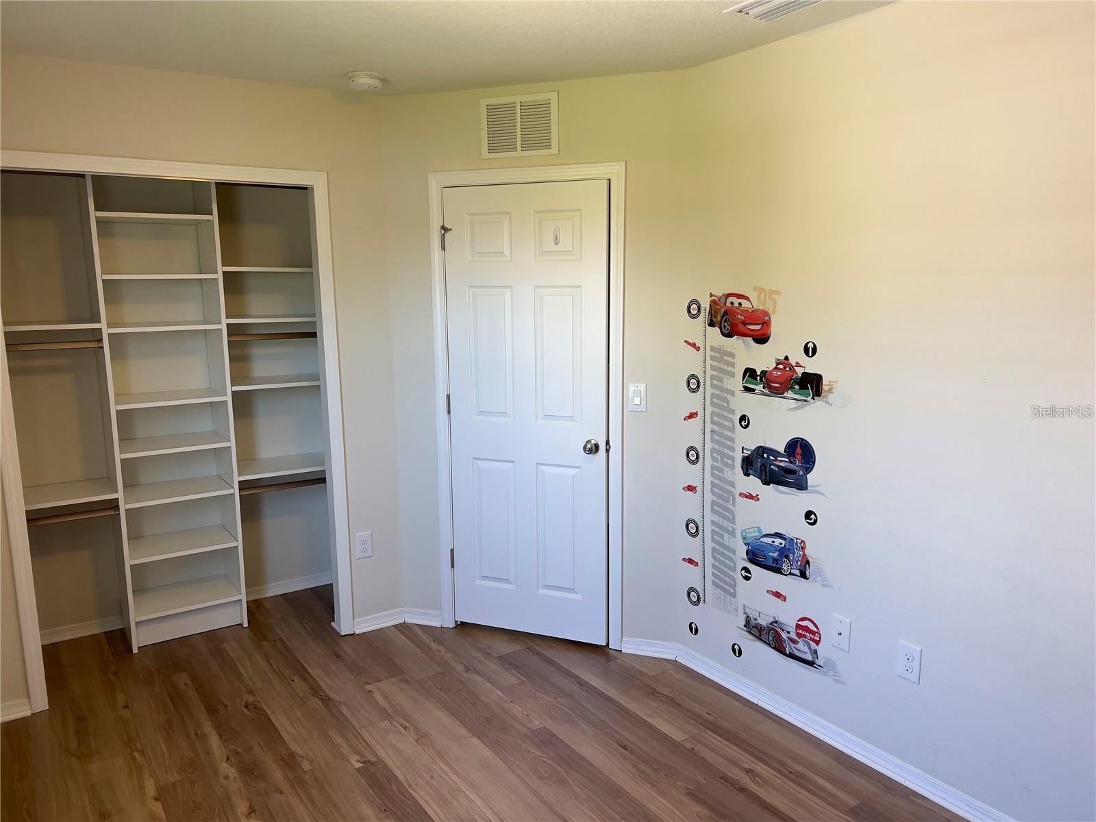 Bedroom 2 with Custom Reach-In Closet