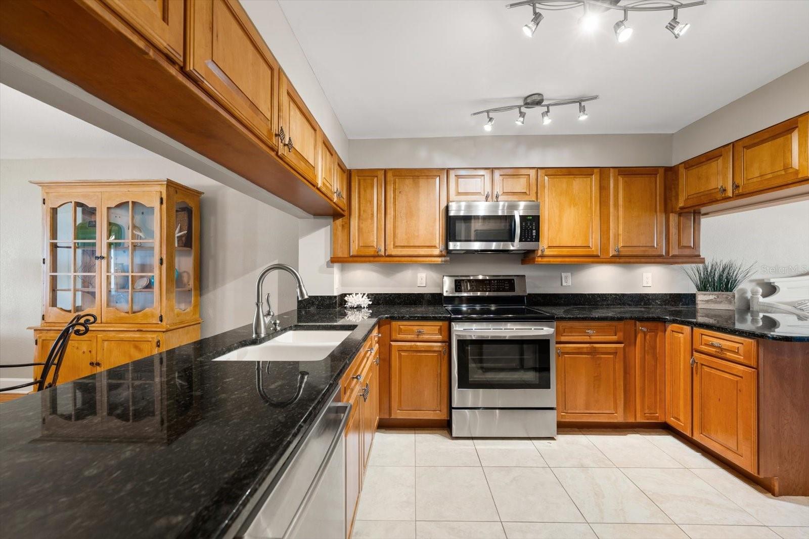 Lots of cabinetry in this bright kitchen