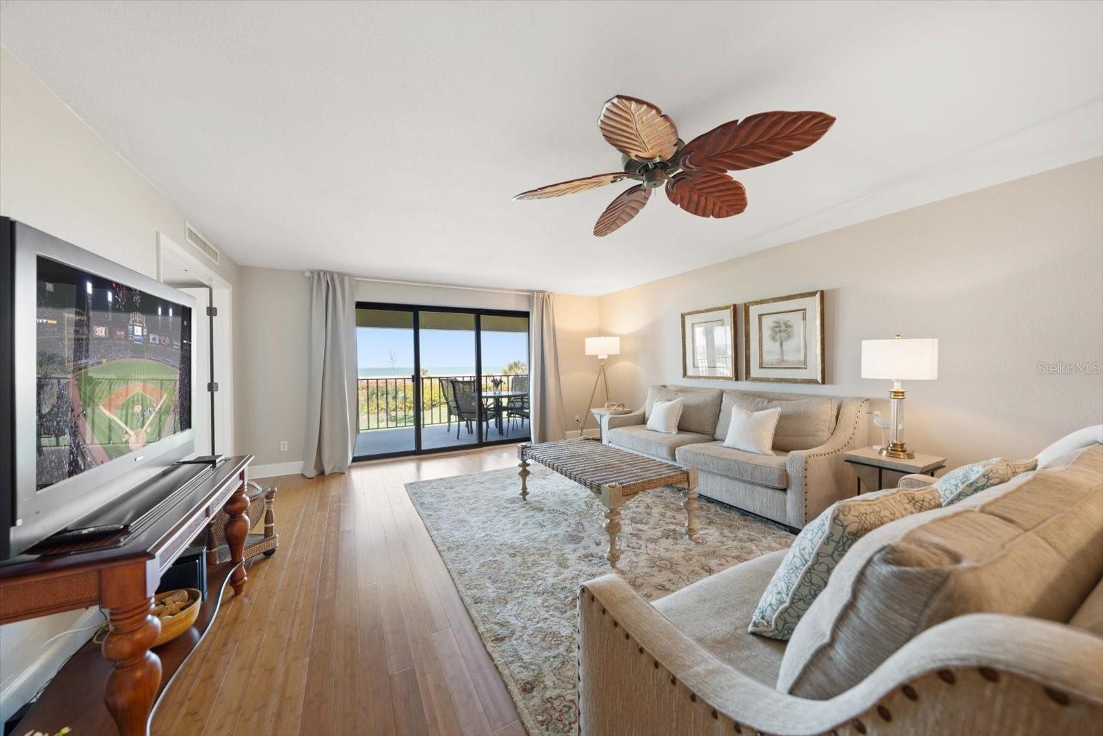 Another view of the living room with a view of the Gulf