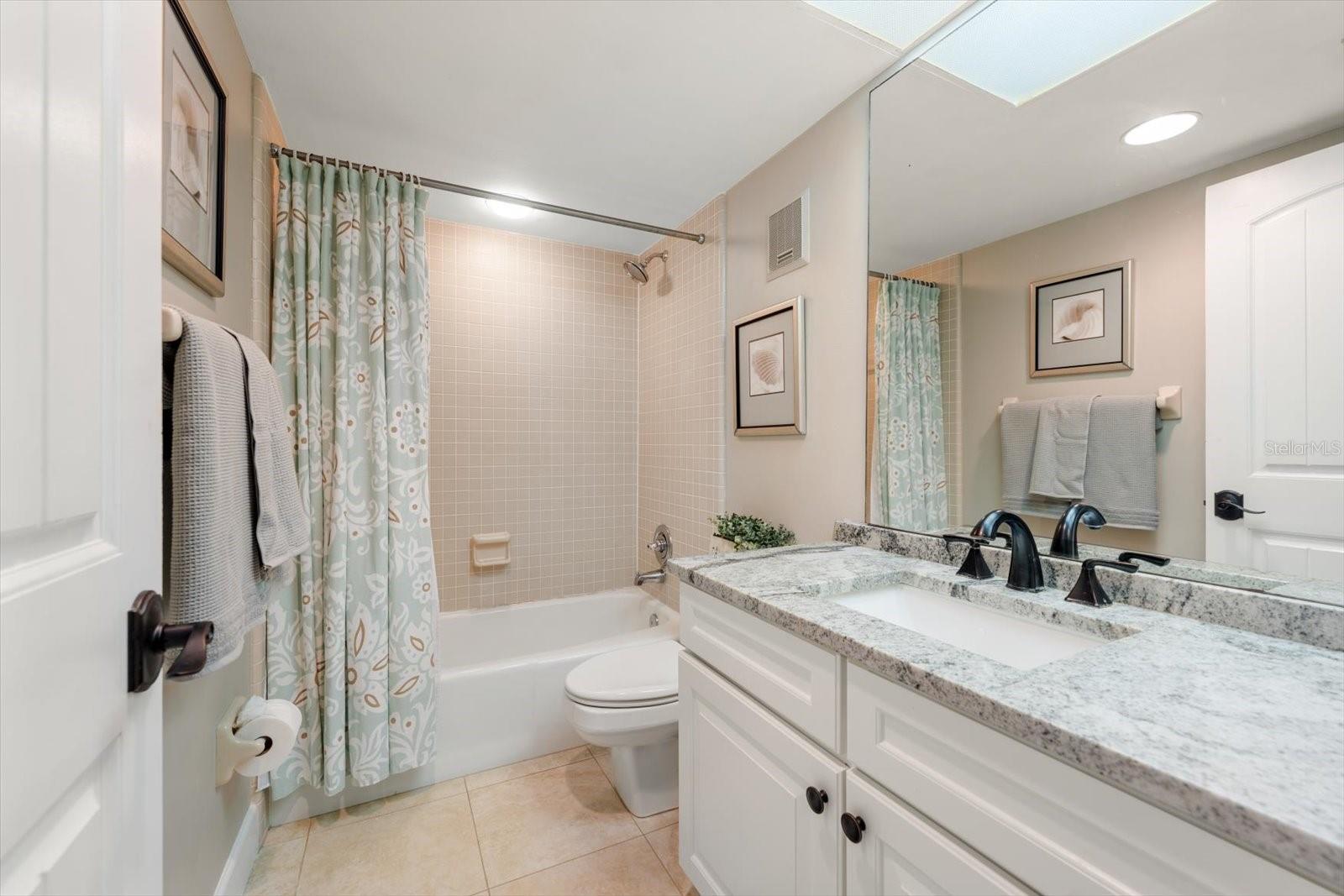 Second bath has a tub and a shower