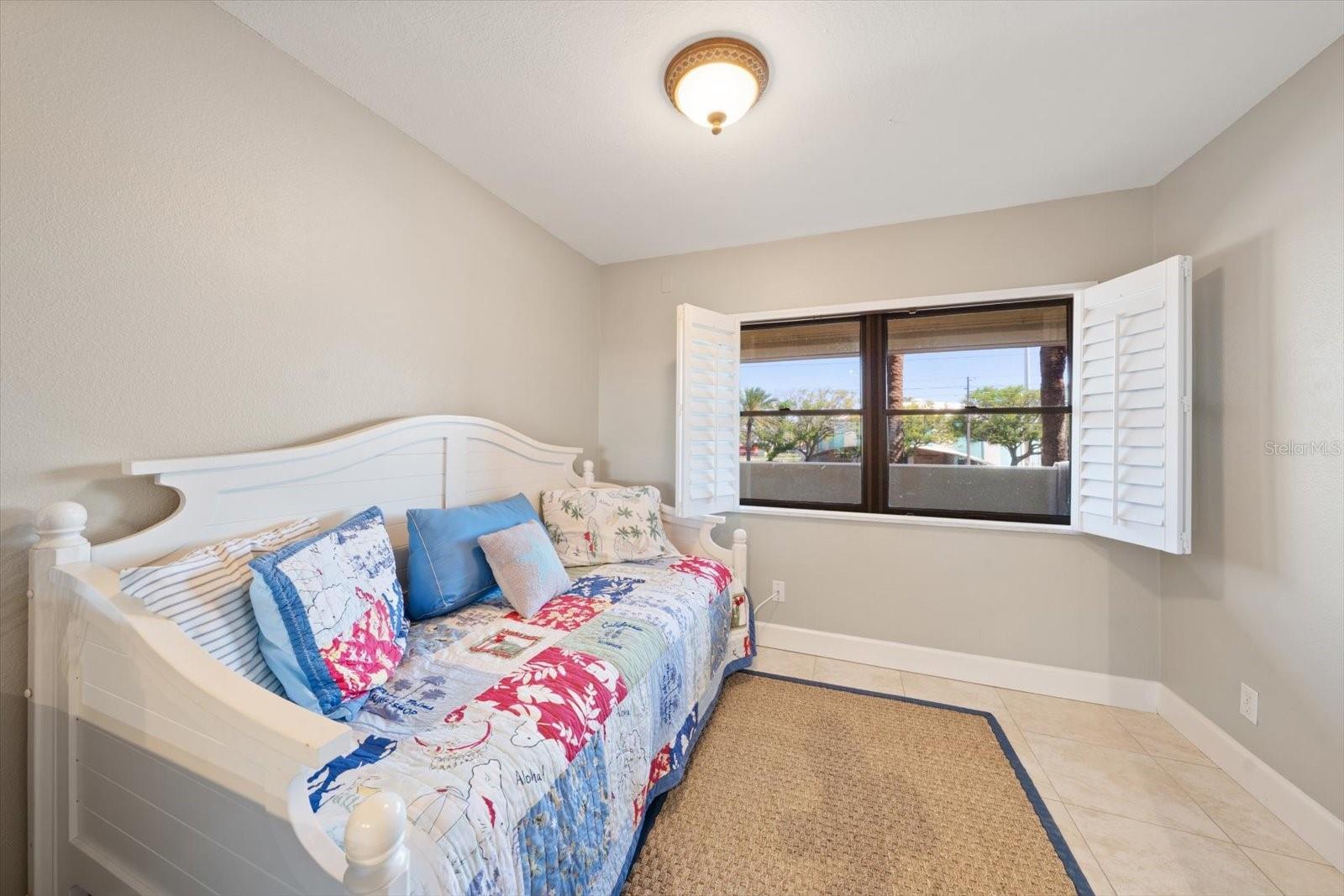 This space, adjacent to the kitchen, could be a home office, additional sleeping area or flex the space however you wish