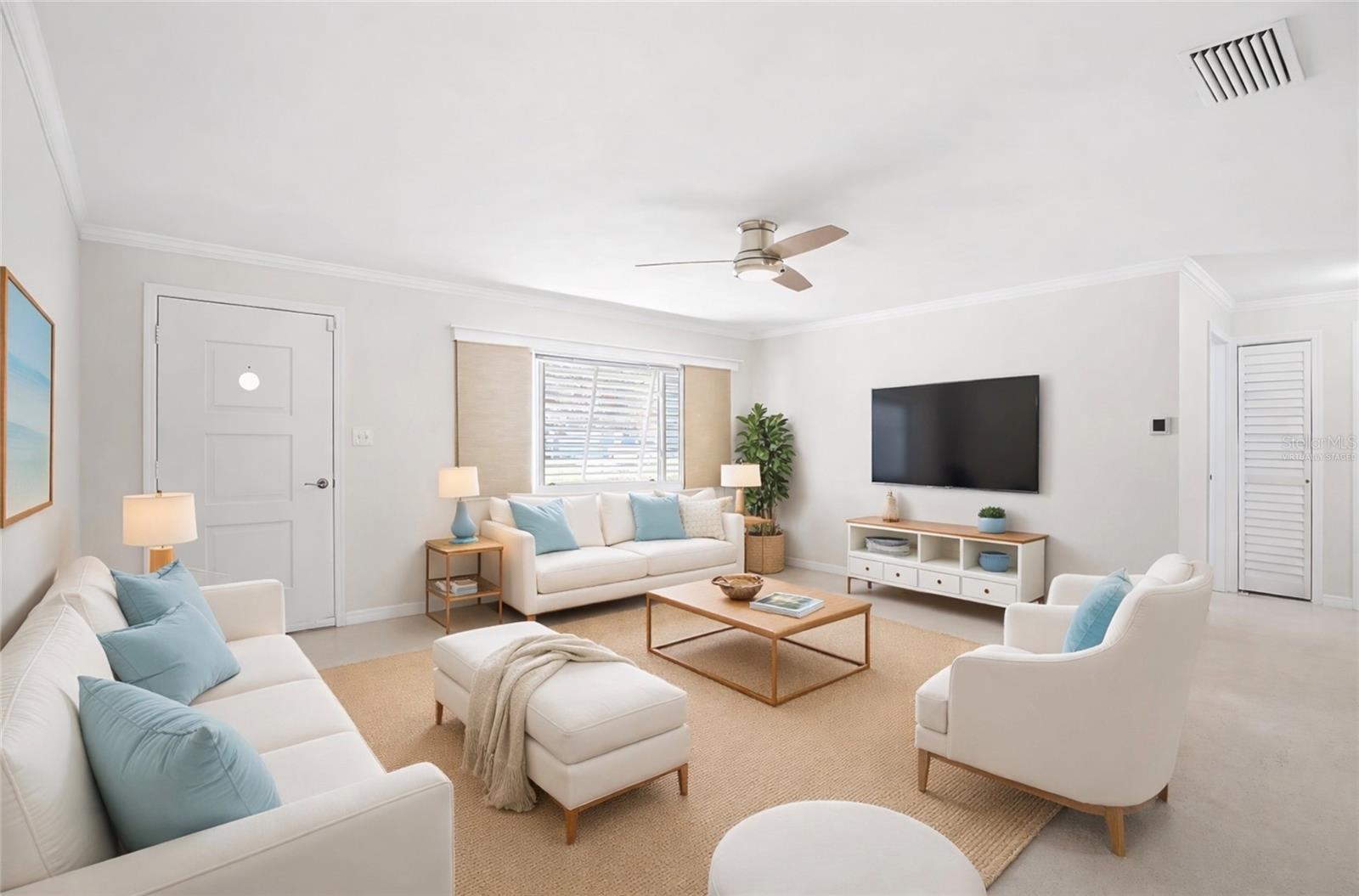 Light-filled living room with flexible layout and clean modern finishes