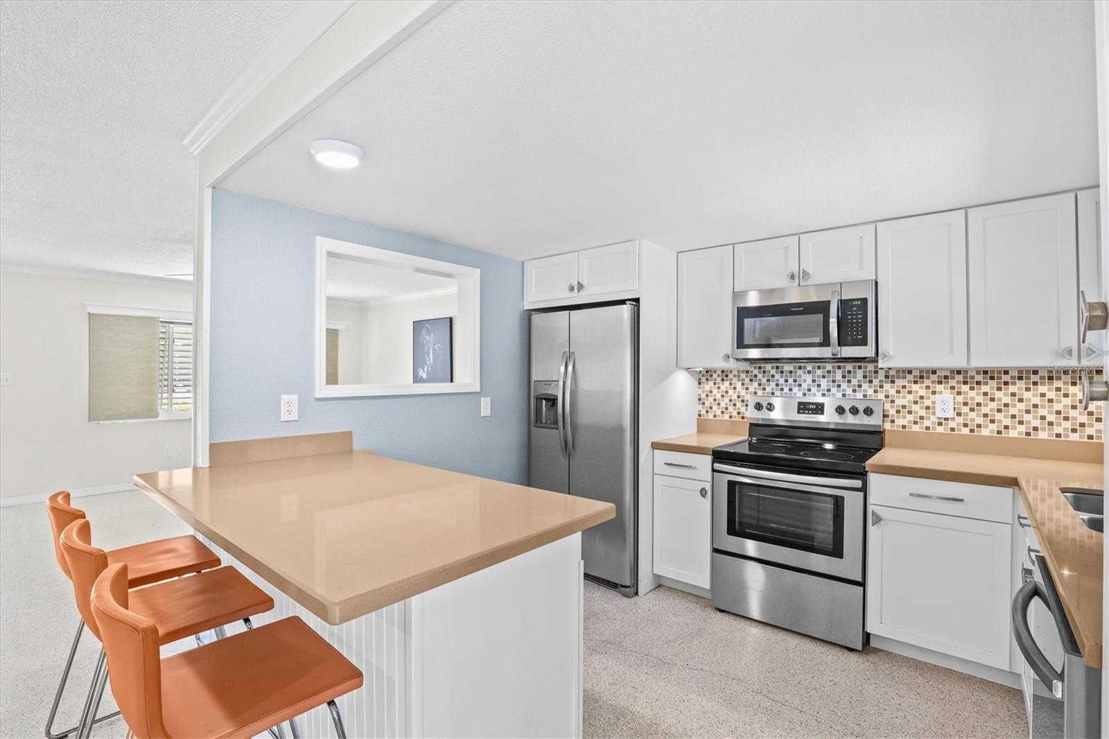 Updated kitchen with ample cabinetry and functional layout