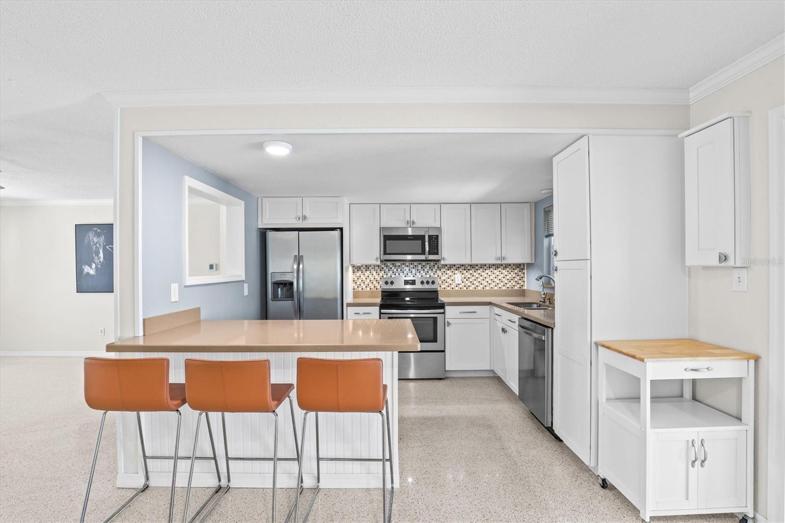 Updated kitchen with ample cabinetry and functional layout